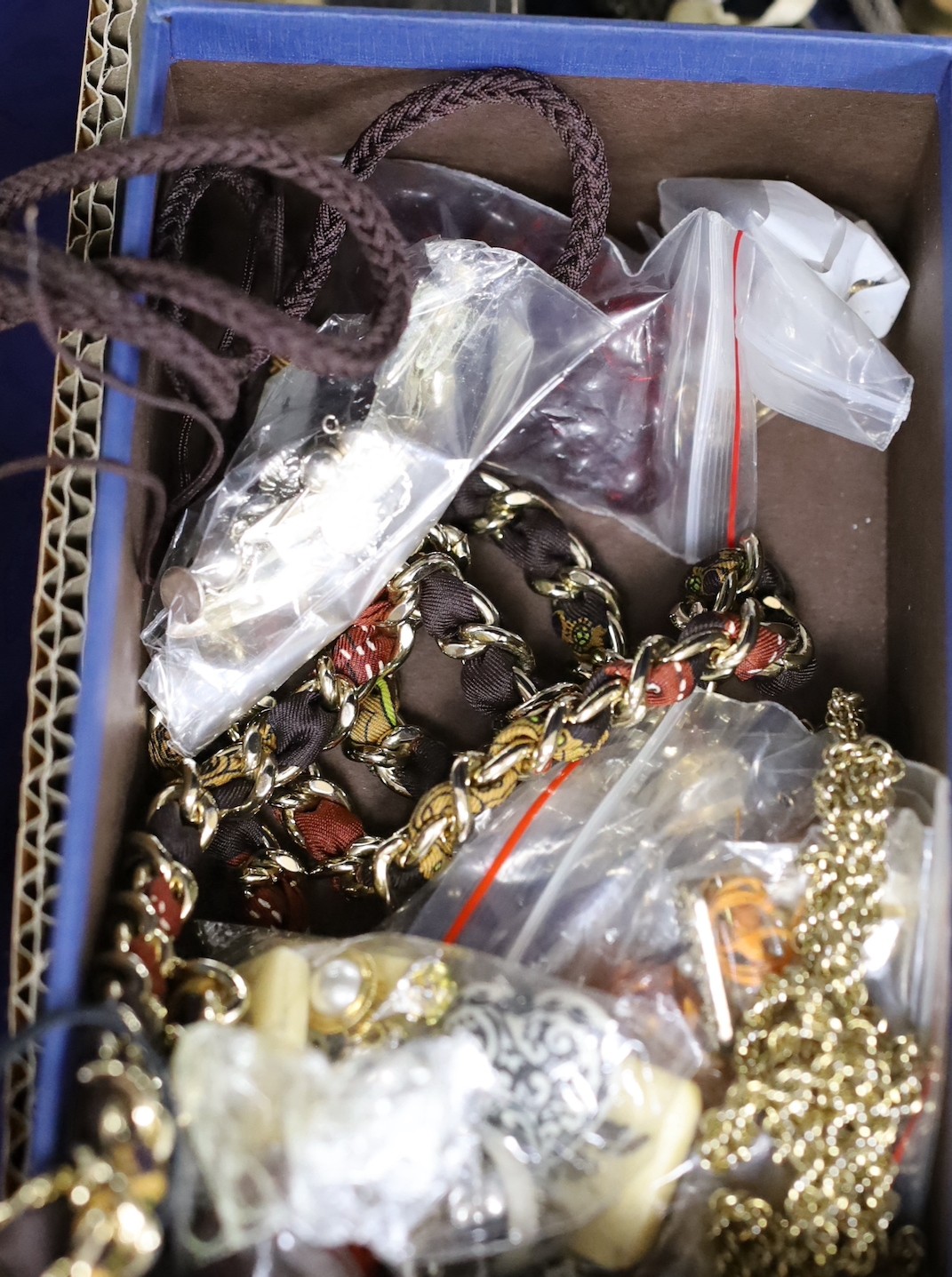 A quantity of assorted costume jewellery, etc. including a gold plated wrist watch.